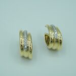 Extravagante Creolen aus 750 Gold mit natürlichen Diamanten