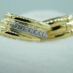 Extravagante Creolen aus 750 Gold mit natürlichen Diamanten