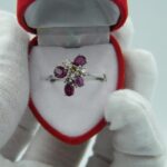 Vintage Ring aus 750 Weißgold mit Rubinen und Diamanten