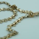 Taschenuhrenkette aus 333 Gold mit Edelsteinen