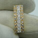 Eleganter Anhänger aus 585er Gelbgold, besetzt mit Zirkonia im Prinzess- und Rundschliff