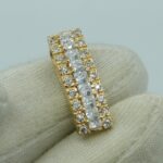 Eleganter Anhänger aus 585er Gelbgold, besetzt mit Zirkonia im Prinzess- und Rundschliff