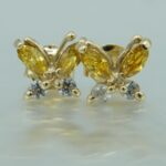 Schmetterlinge Ohrstecker aus 585 Gold mit gelben Zirkonias in Marquiseschliff und Brillantenschliff