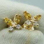 Schmetterlinge Ohrstecker aus 585 Gold mit gelben Zirkonias in Marquiseschliff und Brillantenschliff