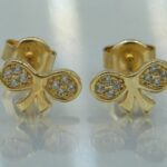 Schleife Ohrstecker aus 585 Gold mit gefassten Zirkonien