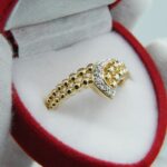 Kugelgoldring aus 750er Gold mit 5 Diamanten