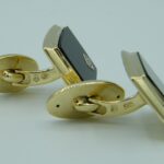 Massive Manschettenknöpfe aus 585/- Gold mit Onyx und Diamanten