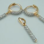 Set aus 585/- massiv Roségold mit mehreren gefassten Zirkonia Steinen