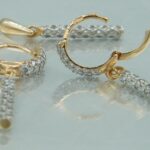 Set aus 585/- massiv Roségold mit mehreren gefassten Zirkonia Steinen